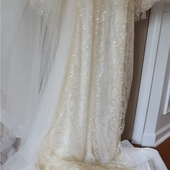 This wedding dress is a size 20. Brand New and had never been worn before.